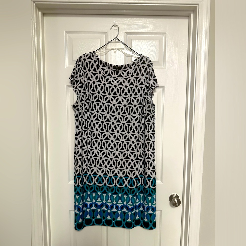 Women’s plus size 2X dress. Asymmetrical one piece slip over head. Multi color